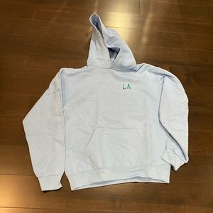 small light blue hoodie with LA logo